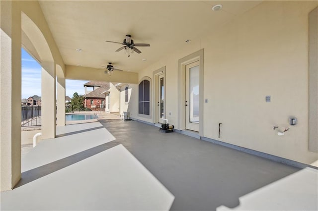 view of patio / terrace featuring ceiling fan