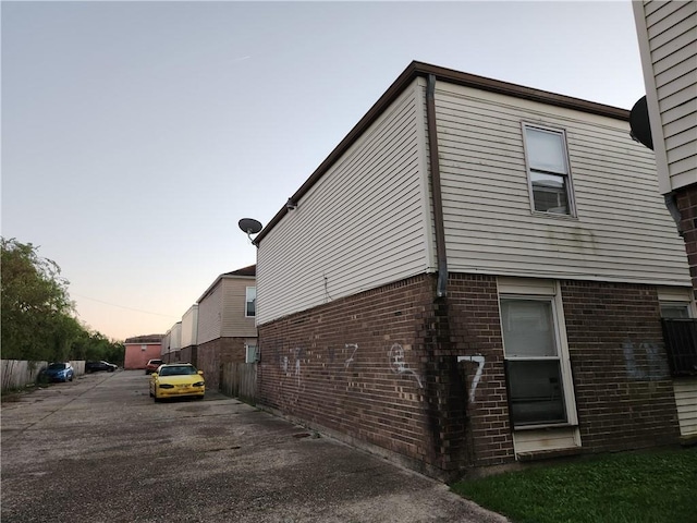 view of property exterior at dusk