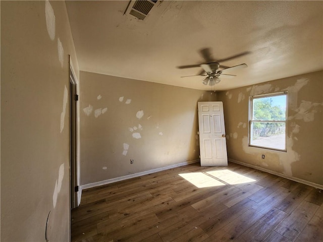 unfurnished bedroom with hardwood / wood-style flooring and ceiling fan