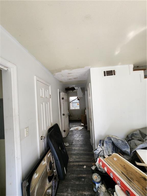 hall featuring dark hardwood / wood-style flooring