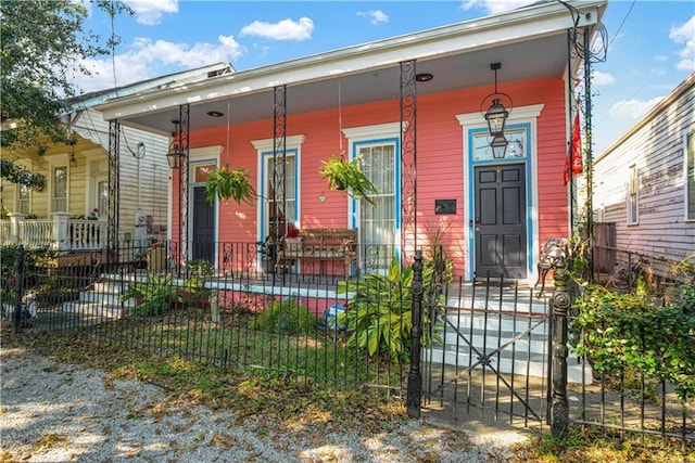 view of front of property featuring covered porch