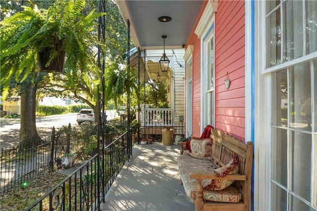 balcony featuring a porch