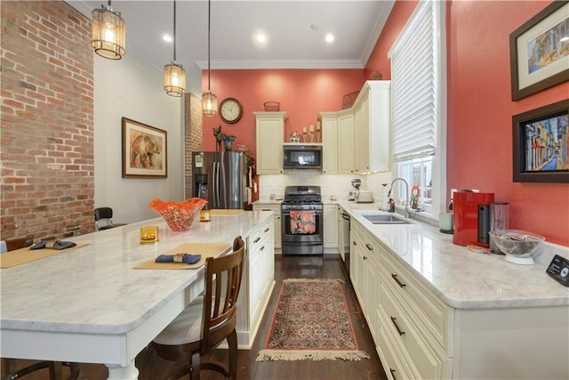 kitchen featuring a kitchen breakfast bar, light stone countertops, pendant lighting, and stainless steel appliances