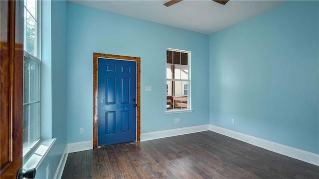 entryway featuring ceiling fan and dark hardwood / wood-style flooring