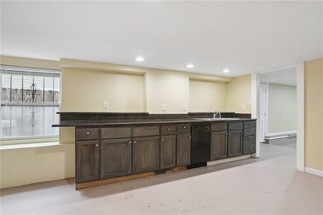 kitchen with dark brown cabinetry, sink, and black dishwasher