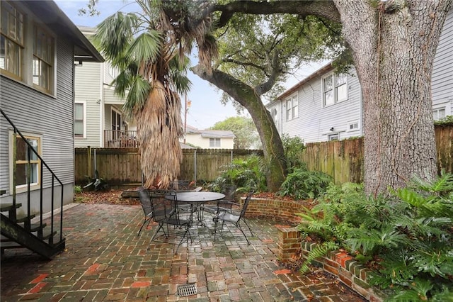 2808 Octavia St, New Orleans, LA 70115 - fenced backyard featuring a patio area and outdoor dining space