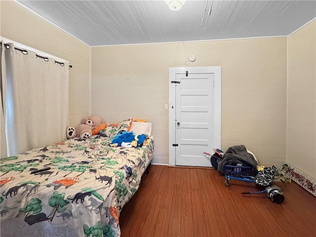 bedroom featuring wood-type flooring