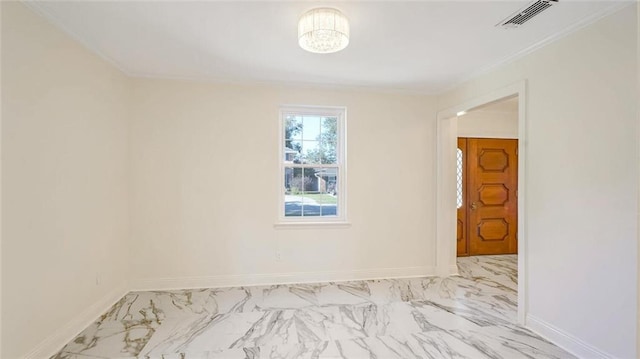 spare room with crown molding