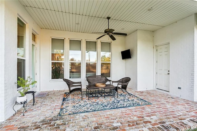 view of patio / terrace featuring a ceiling fan