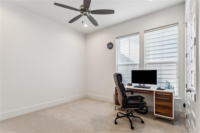 office featuring light carpet, recessed lighting, a ceiling fan, and baseboards