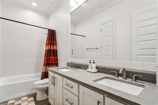 full bathroom with toilet, crown molding, shower / bathtub combination with curtain, and a sink