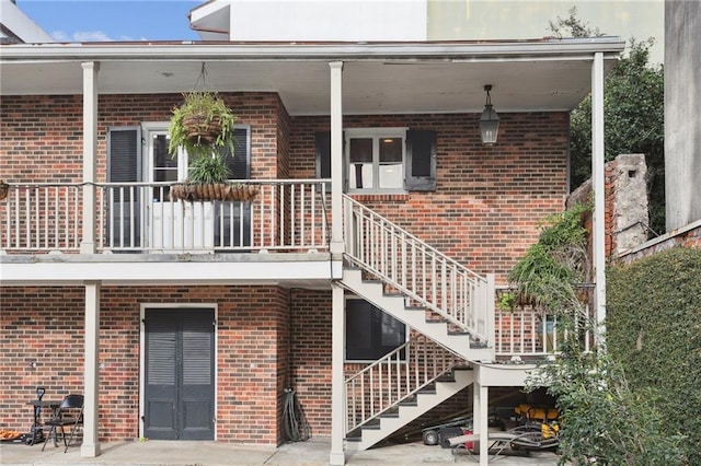 610 N Rampart St Unit F, New Orleans, LA 70112 - view of exterior entry with brick siding