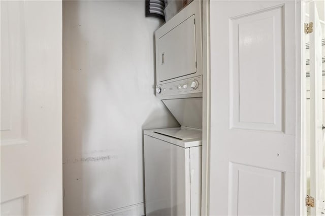 610 N Rampart St Unit F, New Orleans, LA 70112 - washroom with stacked washing machine and dryer