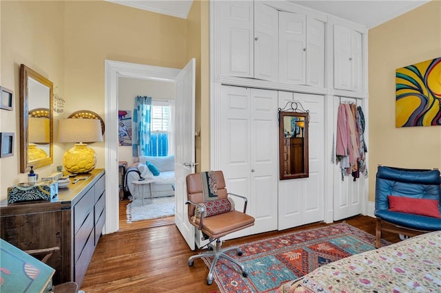 bedroom featuring dark hardwood / wood-style flooring