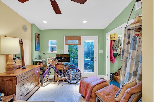 interior space featuring hardwood / wood-style flooring and ceiling fan