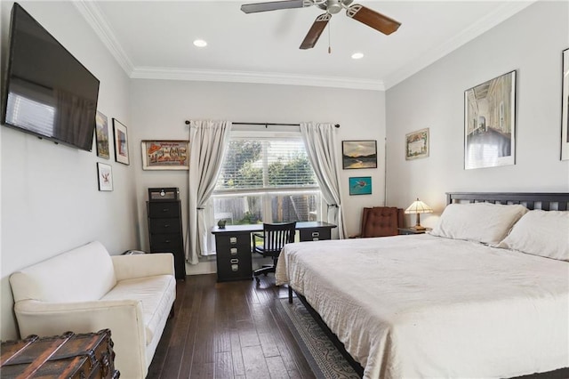 bedroom featuring ceiling fan, dark hardwood / wood-style flooring, and crown molding