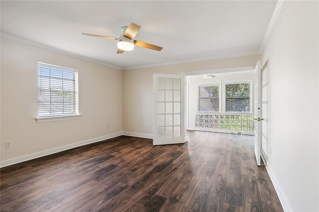 empty room featuring ornamental molding, french doors, ceiling fan, and dark wood-type flooring