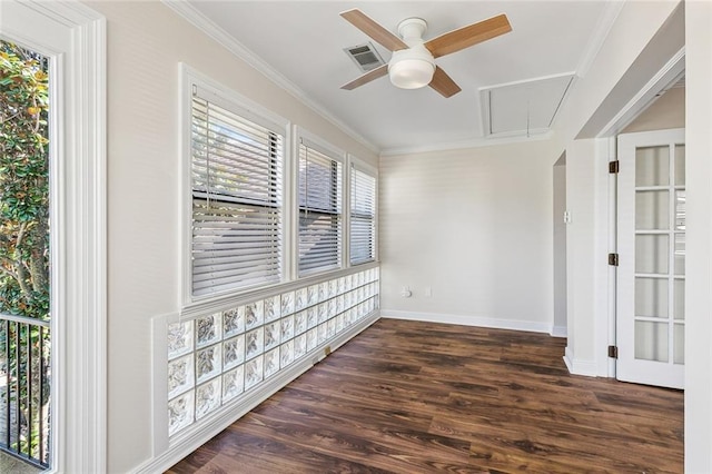 interior space with ornamental molding, ceiling fan, and dark wood-type flooring