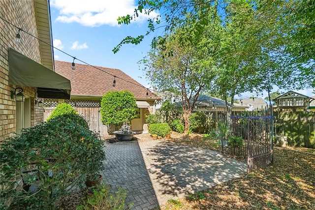 view of yard with a patio area