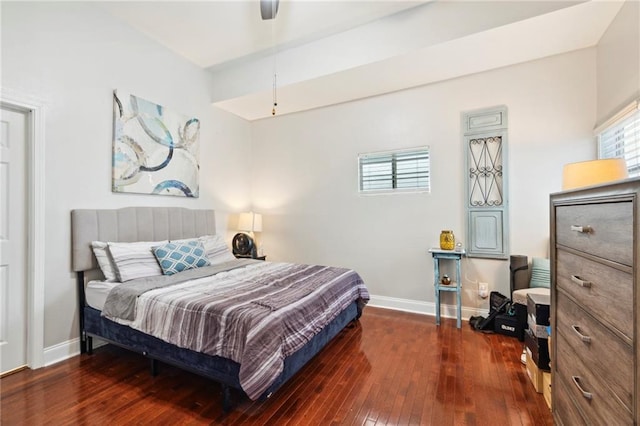 bedroom featuring dark hardwood / wood-style flooring and ceiling fan