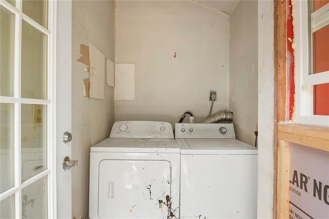 washroom featuring washer and clothes dryer