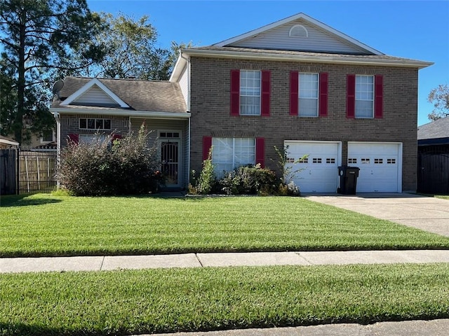 view of front of property with a garage and a front yard