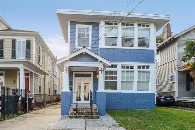 1127 Fern St, New Orleans, LA 70118 - view of front of home with french doors