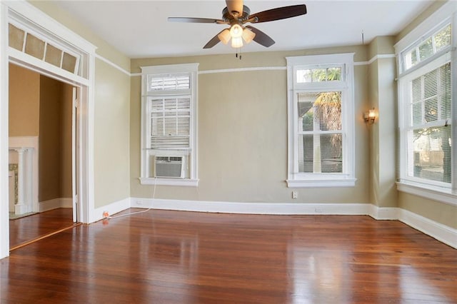 1127 Fern St, New Orleans, LA 70118 - empty room featuring wood finished floors, a ceiling fan, and baseboards