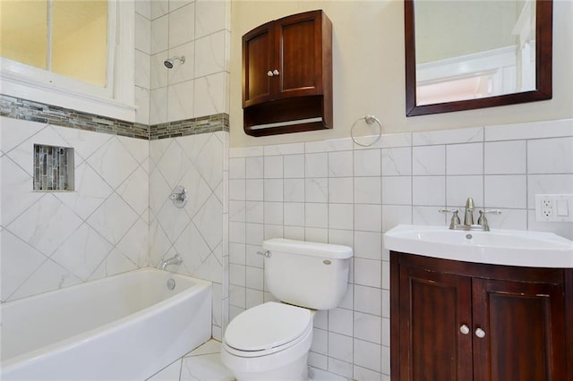 1127 Fern St, New Orleans, LA 70118 - full bathroom with vanity, tile walls, toilet, and shower / bath combination