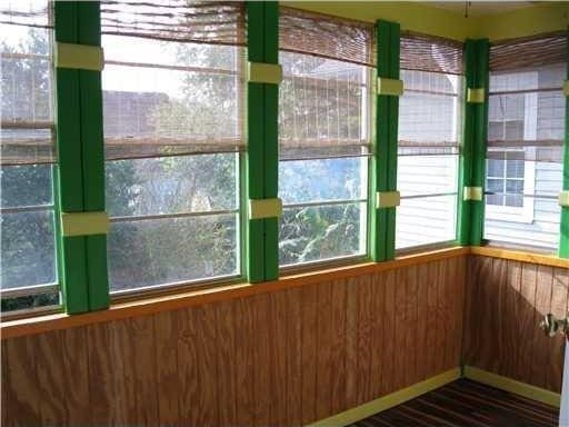 1127 Fern St, New Orleans, LA 70118 - unfurnished sunroom with plenty of natural light
