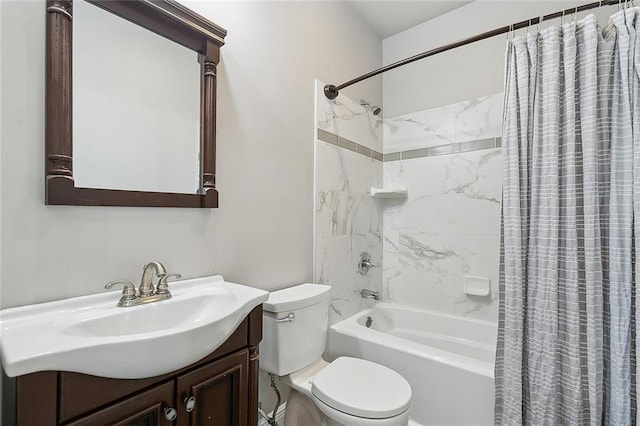 bathroom featuring toilet, shower / tub combo, and vanity