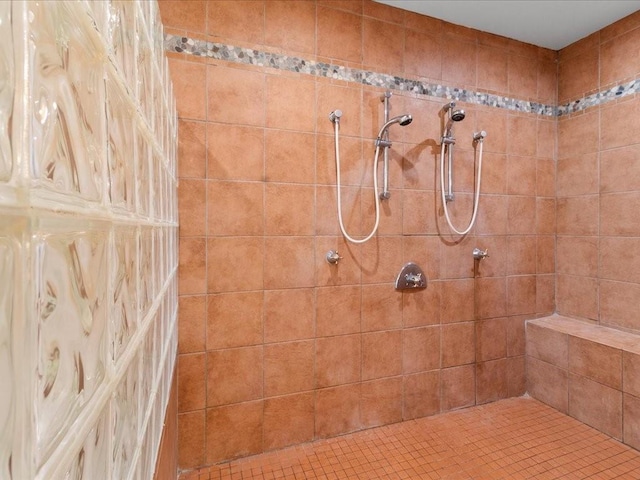 bathroom featuring tiled shower