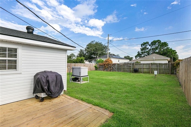 view of yard with a wooden deck