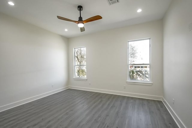 6721 Manchester St, New Orleans, LA 70126 - spare room featuring plenty of natural light, recessed lighting, dark wood-type flooring, and a ceiling fan