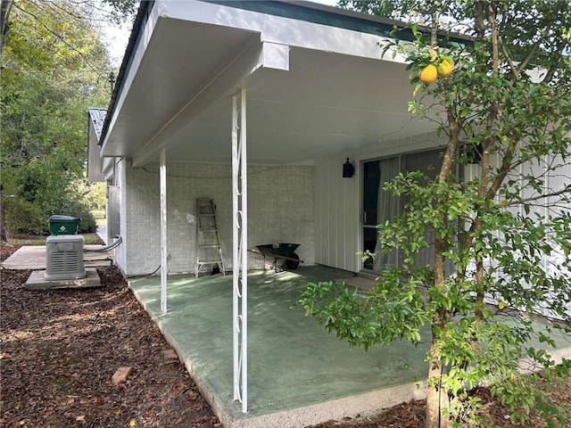 exterior space featuring brick siding