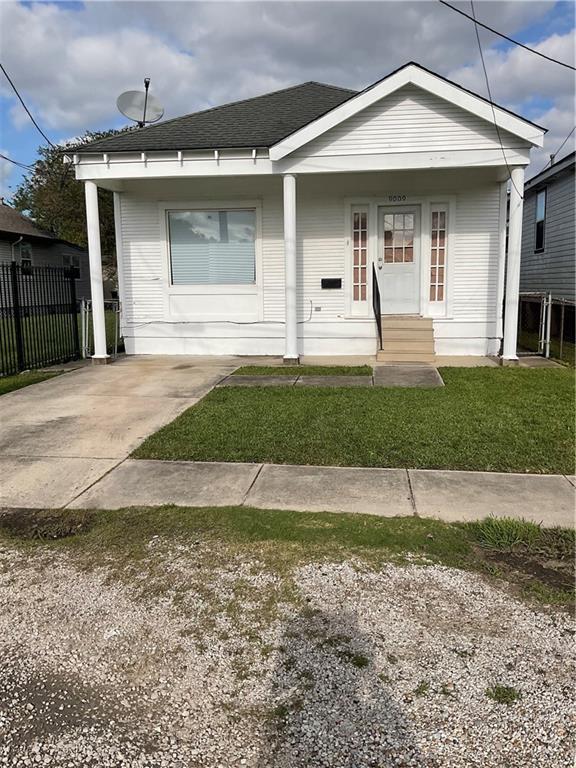 9009 Belfast St, New Orleans, LA 70118 - view of front of home with roof with shingles