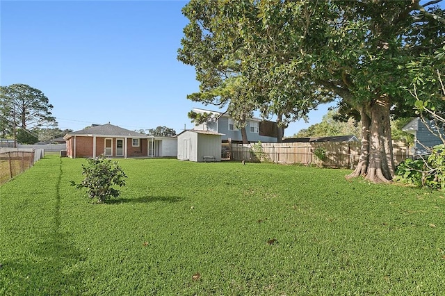 view of yard with a storage shed