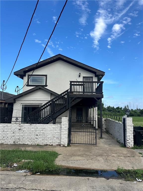 view of home's exterior featuring a deck