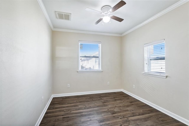 empty room with ceiling fan, dark hardwood / wood-style flooring, and crown molding