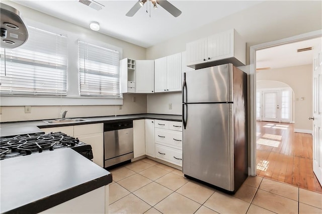 kitchen with french doors, ceiling fan, light wood-type flooring, appliances with stainless steel finishes, and white cabinetry