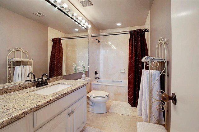 carpeted bedroom featuring multiple windows, ceiling fan, and a closet