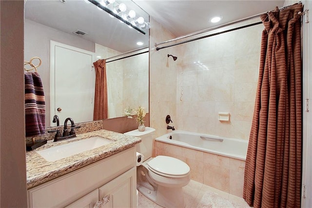 full bath with tiled shower / bath combo, tile patterned flooring, vanity, toilet, and recessed lighting