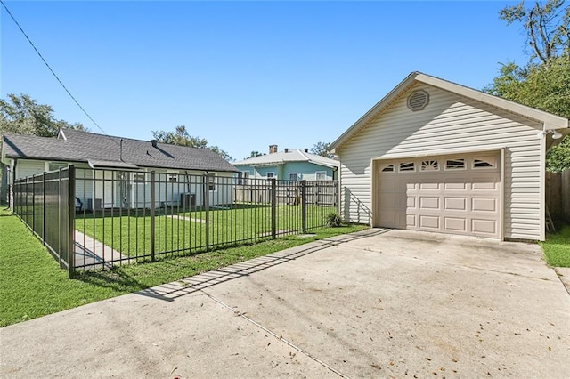 garage with a lawn