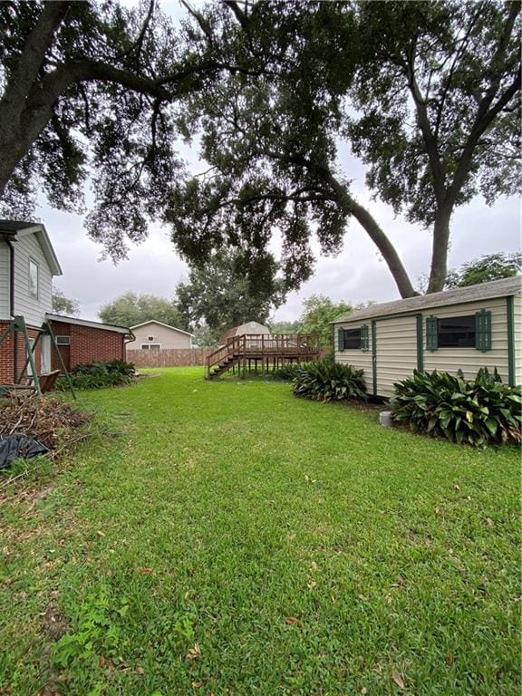 view of yard featuring a deck