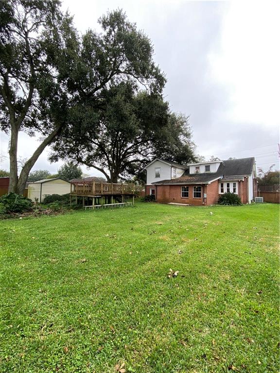 view of yard with a deck