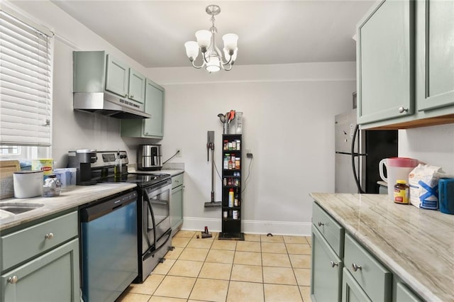 kitchen with stainless steel appliances, an inviting chandelier, green cabinets, and light tile patterned flooring