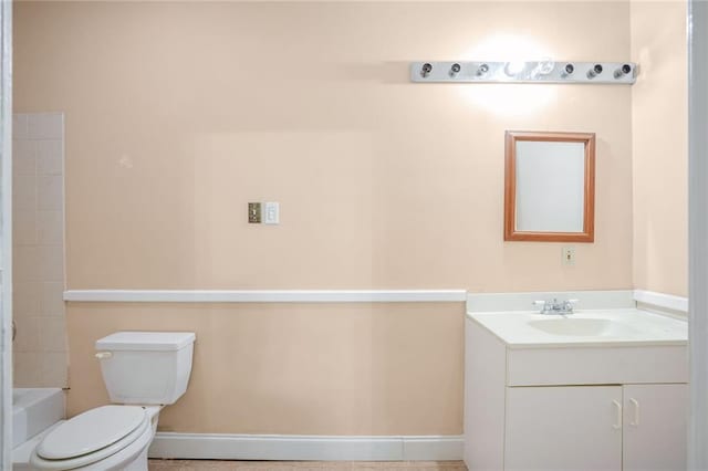 full bathroom featuring tile patterned floors, vanity, tub / shower combination, and toilet