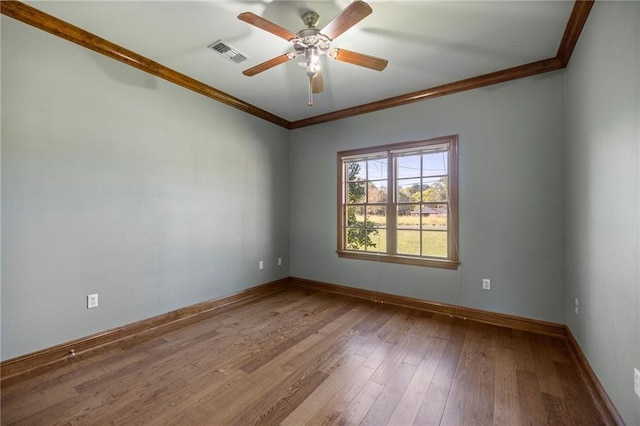 unfurnished room featuring light hardwood / wood-style flooring, ceiling fan, and crown molding