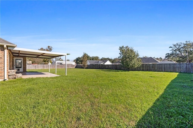 view of yard with a patio area