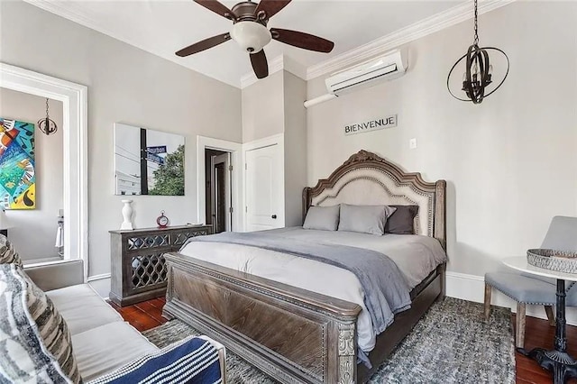 bedroom with a wall unit AC, crown molding, dark hardwood / wood-style floors, and ceiling fan with notable chandelier